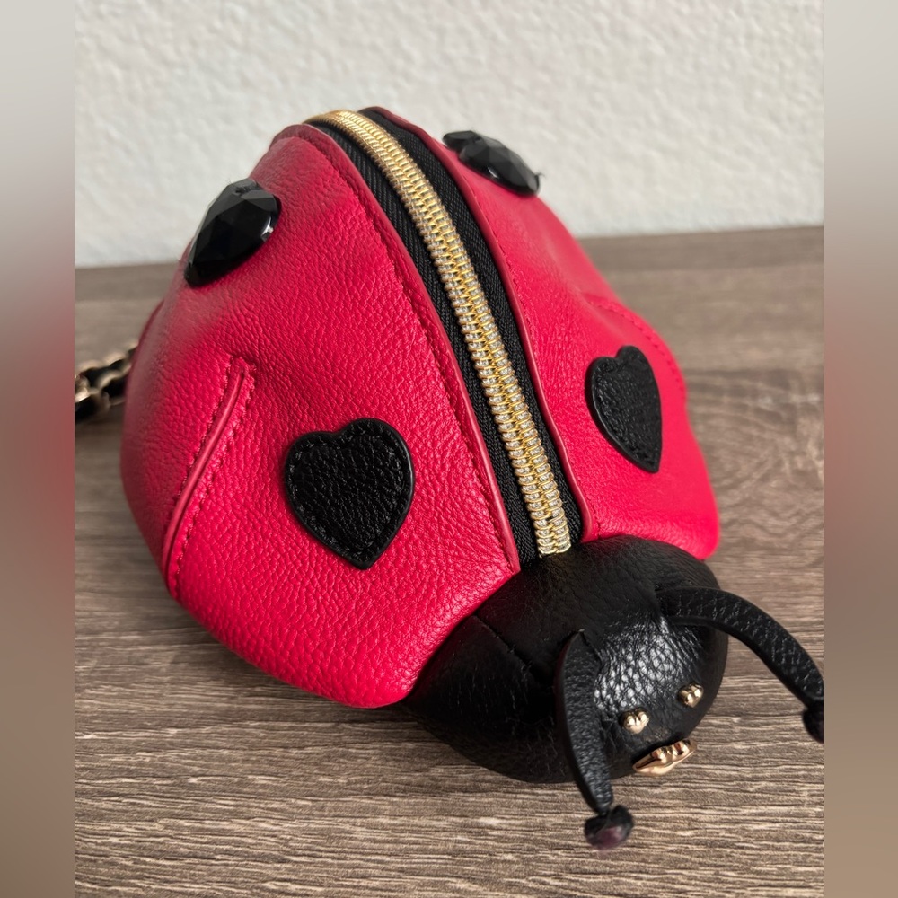 Betsey Johnson love bug wristlet